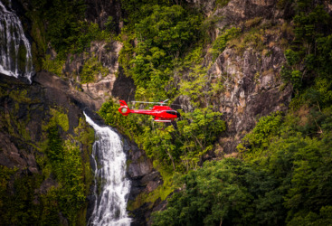 Enjoy a private scenic helicopter flight to a private waterfall in the Daintree Rainforest