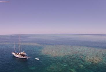 Aerial View of the liveaboard sail boat off Cairns on the Great Barrier Reef