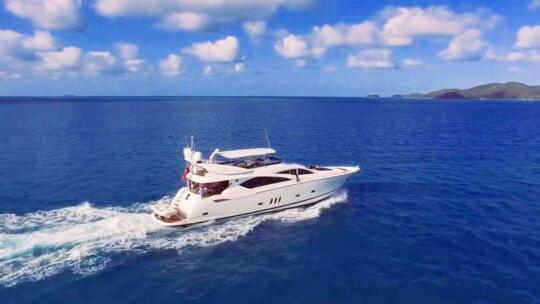 Whitsunday Superyacht Charters - Luxury charter yacht under steam on the Great Barrier Reef
