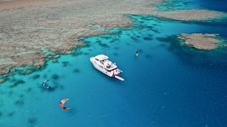 Cairns Yacht Charters - Aerial View of Yacht at Anchor