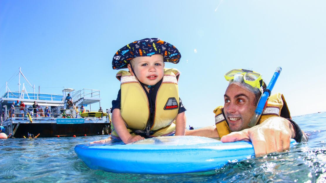 Child enjoying the Whitsundays Great Barrier Reef pontoon in Australia