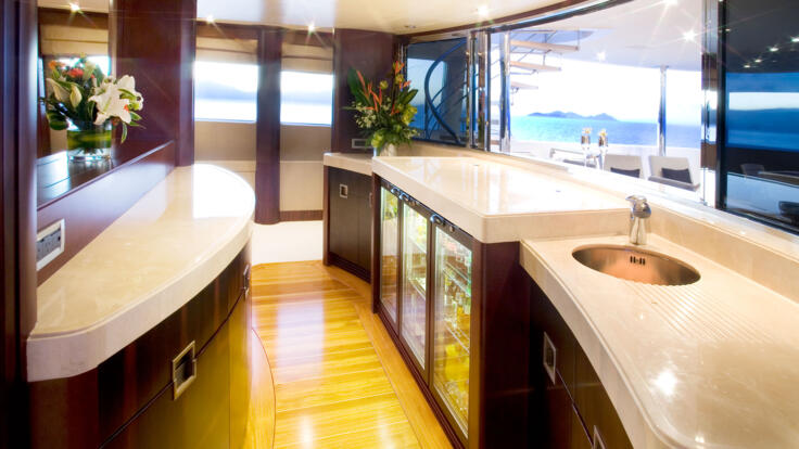 Whitsunday Yacht Charters - Bridge deck bar - opens to outdoor relaxation area 