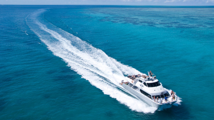 Cairns Charter Boats -  Aerial view of Great Barrier Reef Cruise out to Upolu Cay