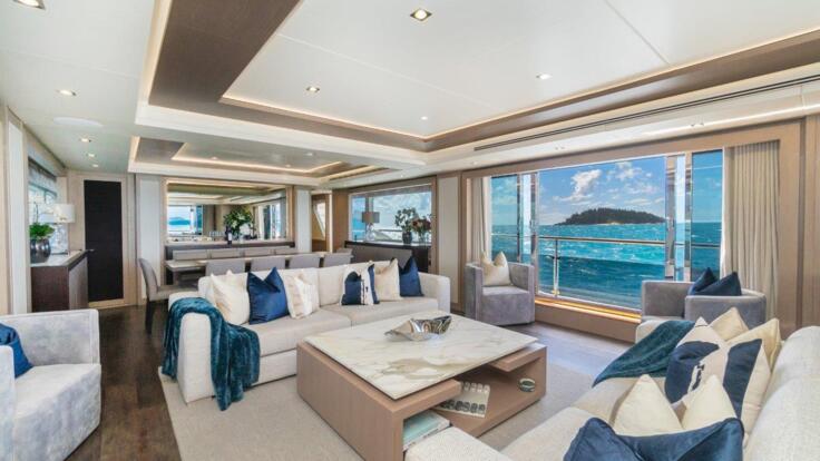 The main saloon with sliding glass doors for stunning ocean views | Whitsundays Luxury Charter Yacht