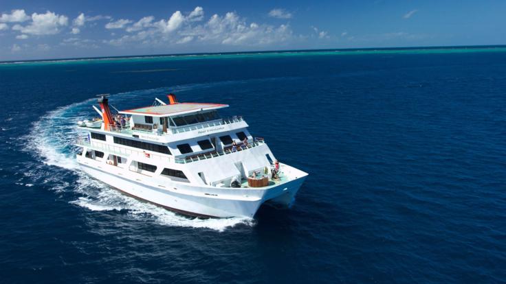 Cairns Dive Tours - A floating hotel on the Great Barrier Reef - Aerial View