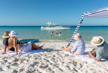 Relax on Whitehaven Beach - Whitsunday Private Chat Boat